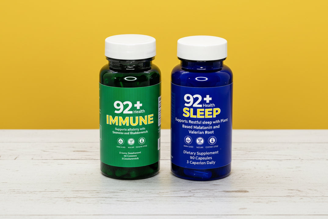 92+ Day and Night System sea moss daily multivitamins immune support and sleep support bottles on wooden surface